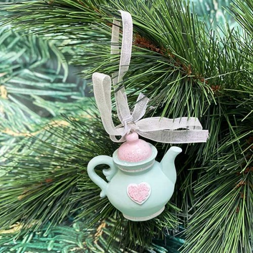 Tea pot with ribbon decoration 
